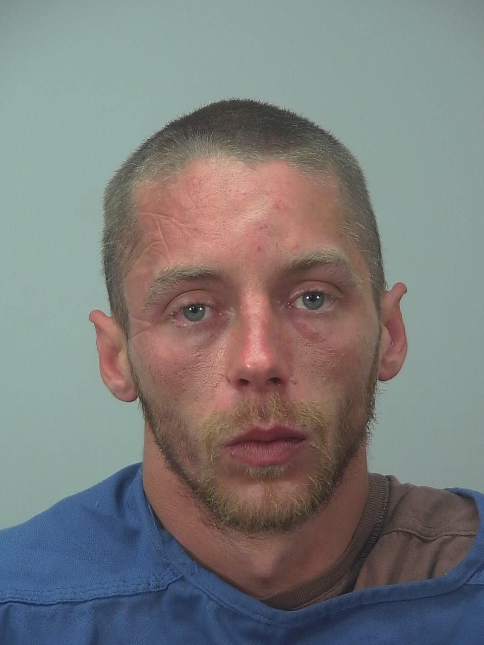 Madison man arrested for allegedly choking, pulling knife on man he knew